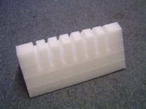Slotted foam fitting